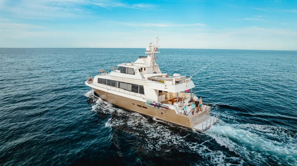 Luxury Tag Cabo yacht cruising the blue water off Cabo San Lucas